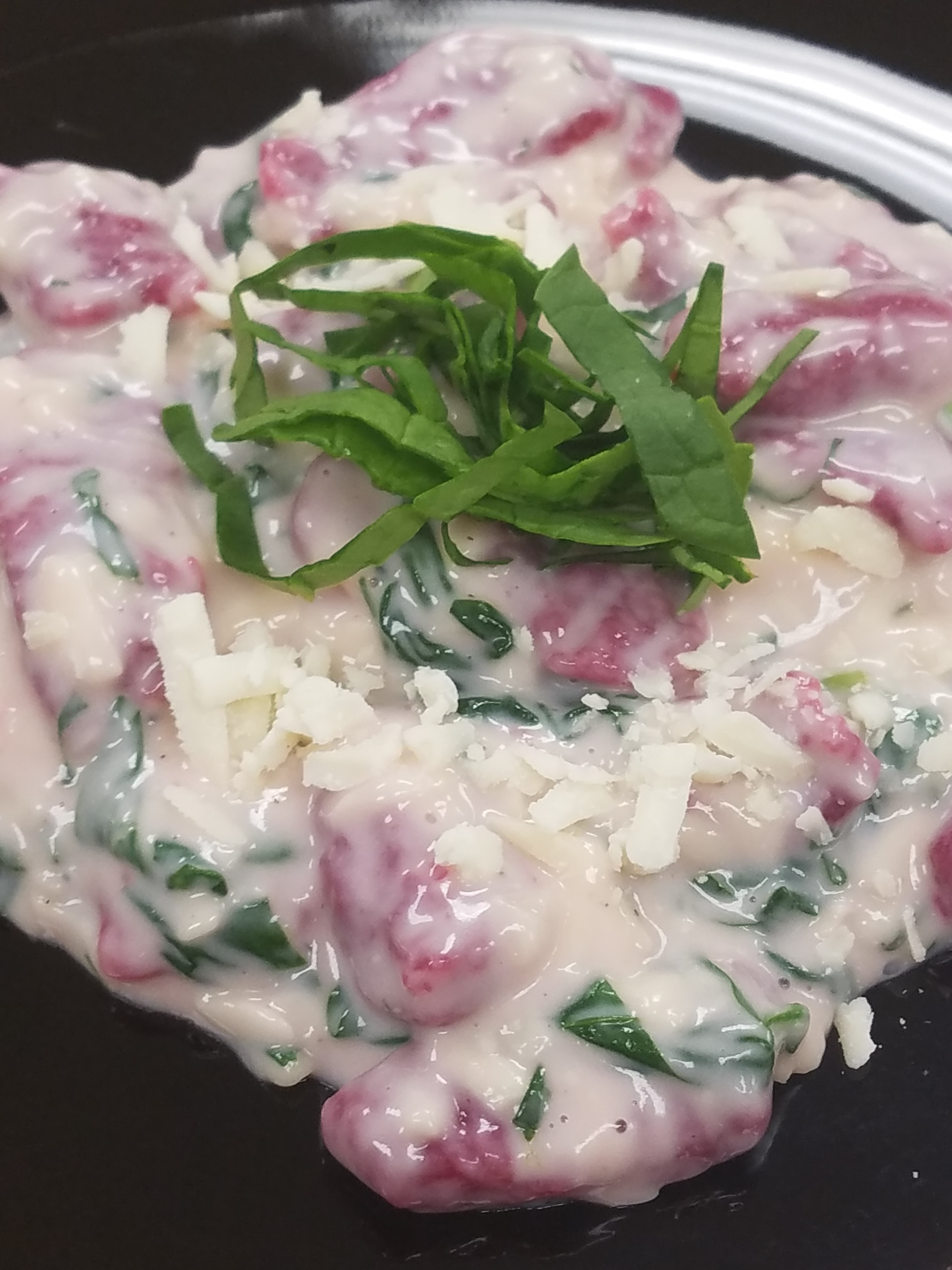 Beet Gnocchi with Spinach Parmesan Sauce